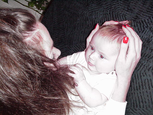 I also like playing with my mommy's hair