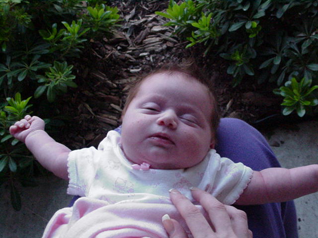 TAKING A NAP ON THE FRONT PORCH.