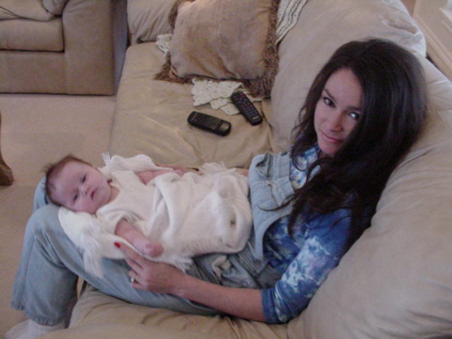 Sacked out on my mommy's lap