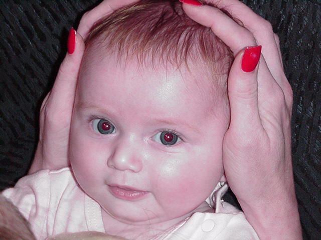 I like being in my mommy's hands!!!